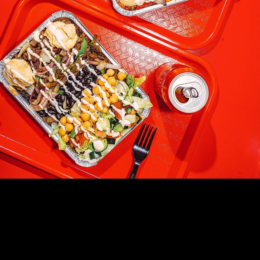 Platter tray with hummus, chickpeas and white sauce